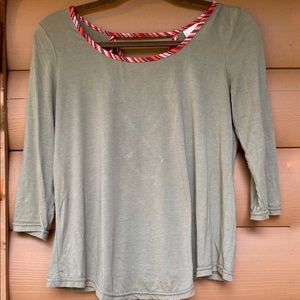 Green quarter sleeve with open back detail